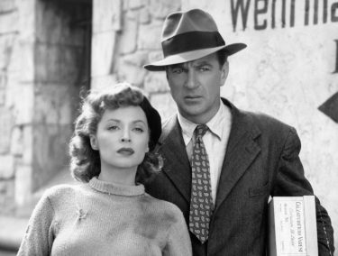 a man and a woman looking puzzled