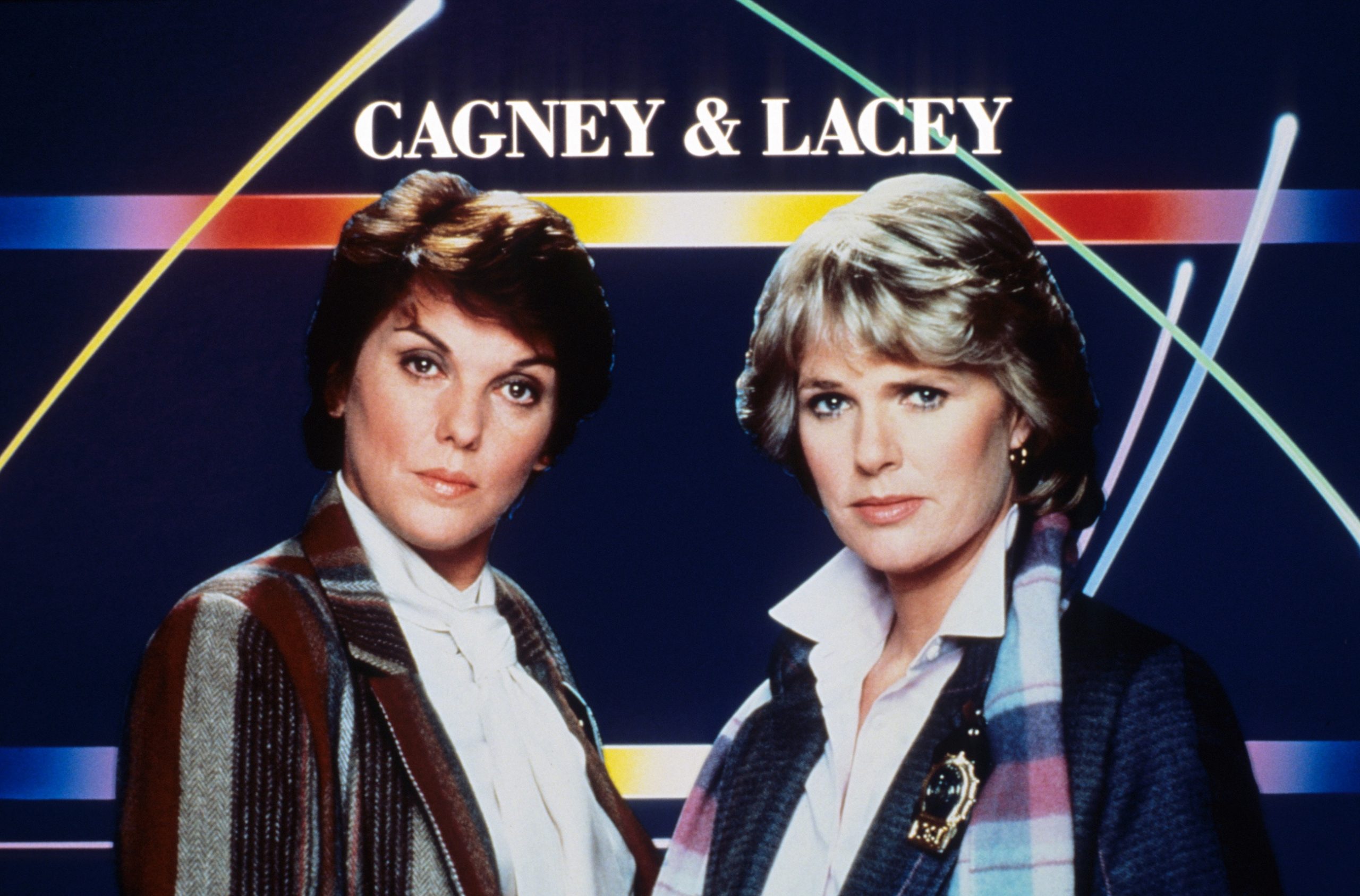 2 women looking towards the camera in a tough manner. above them says cagney and lacey