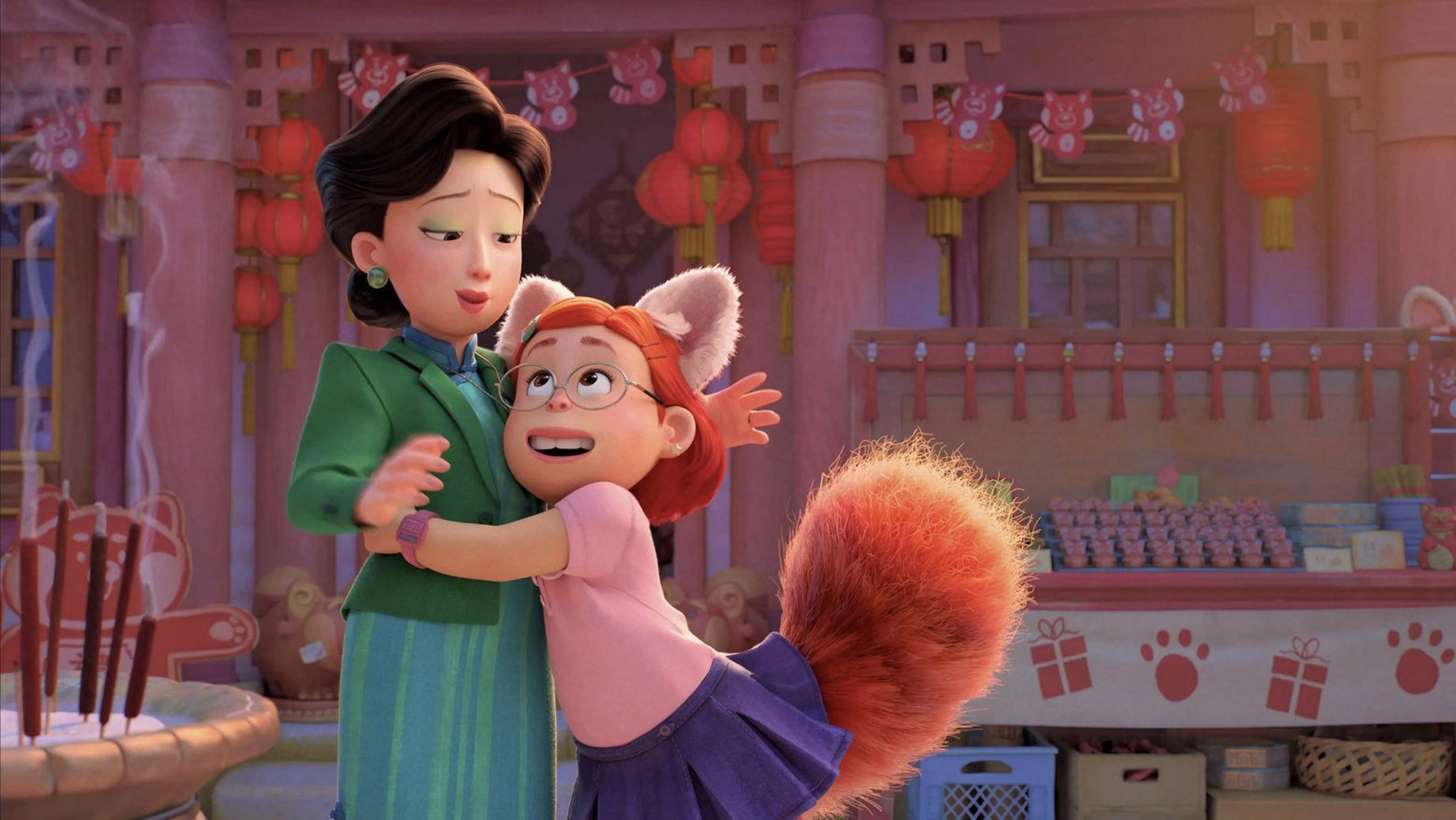 A young girl with animal ears and a tail hugging her mother.