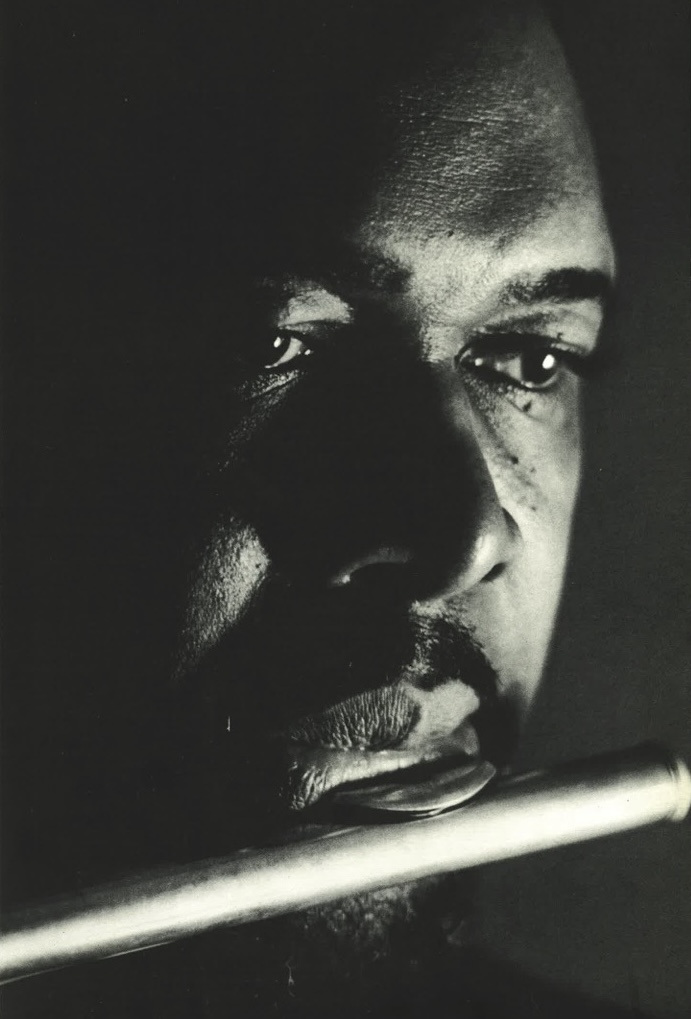 Buddy Collette playing the flute