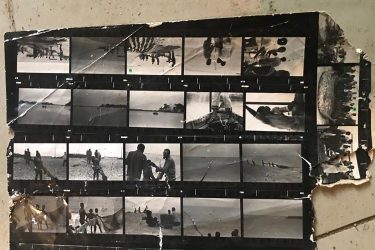 Contact sheet of black-and-white photographs showing people at a beach
