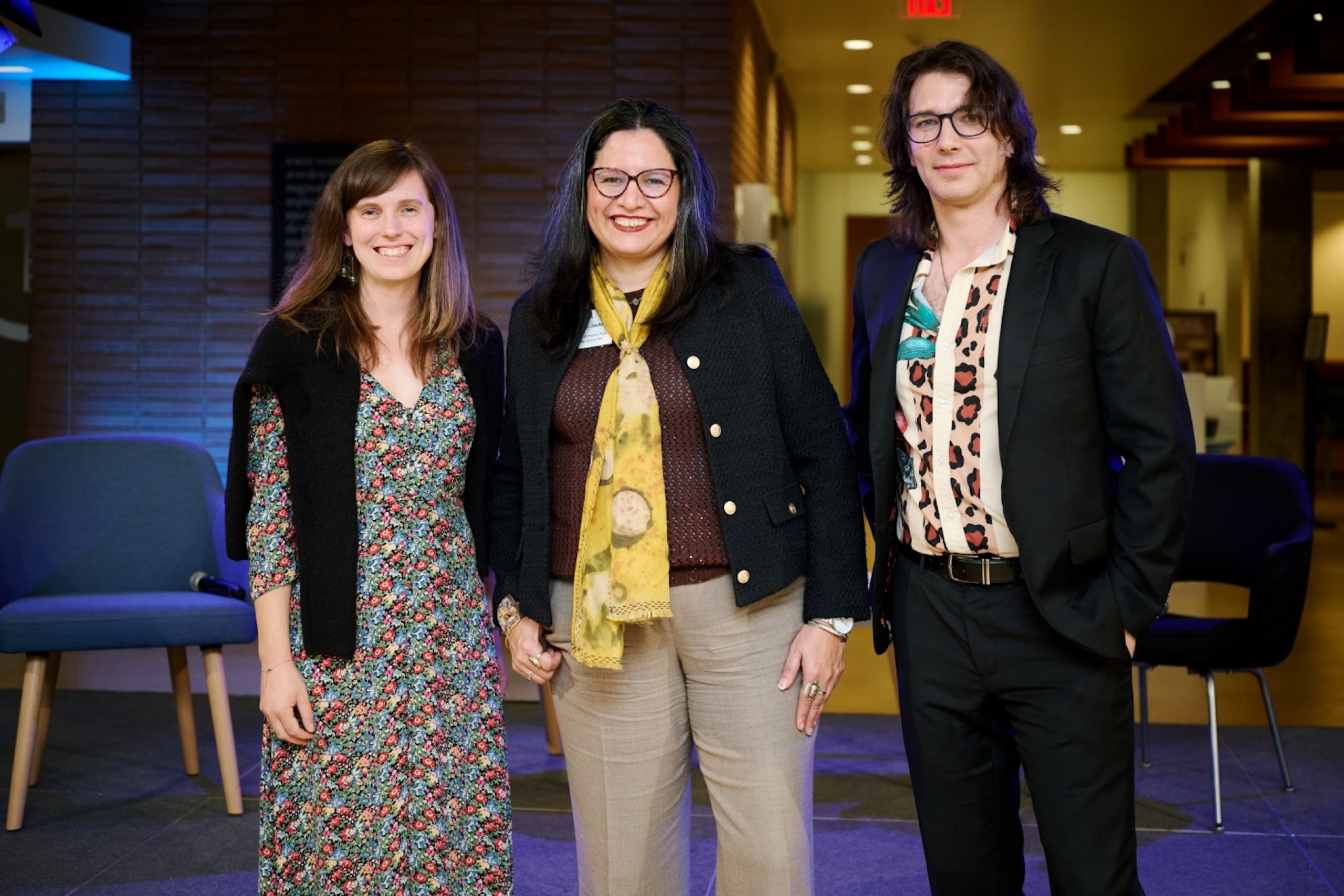 Librarians Katherine Kapsidelis and Devin Fitzgerald join University Librarian Athena N. Jackson at Young Research Library for Powell Society event.