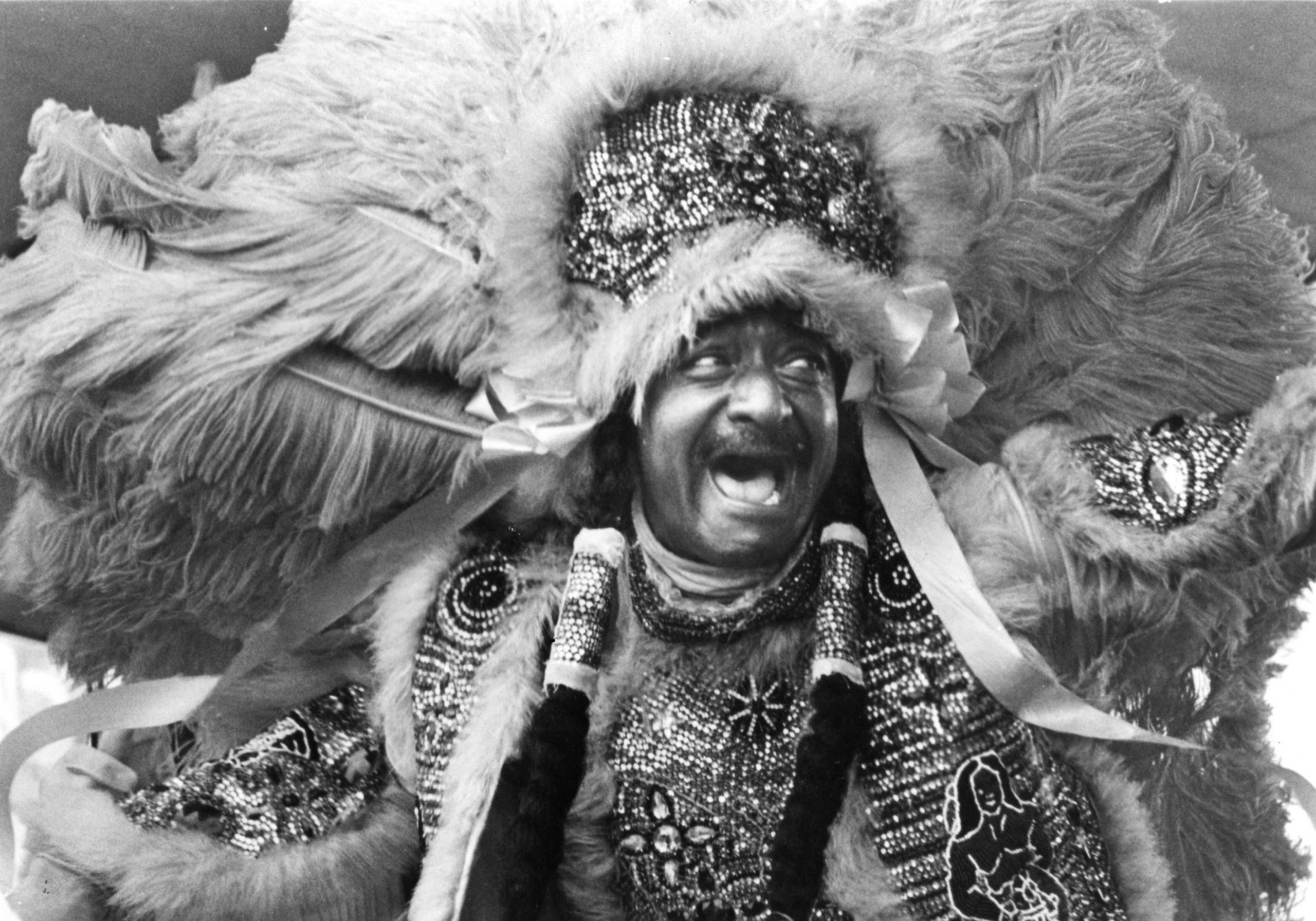 man wearing a large headdress