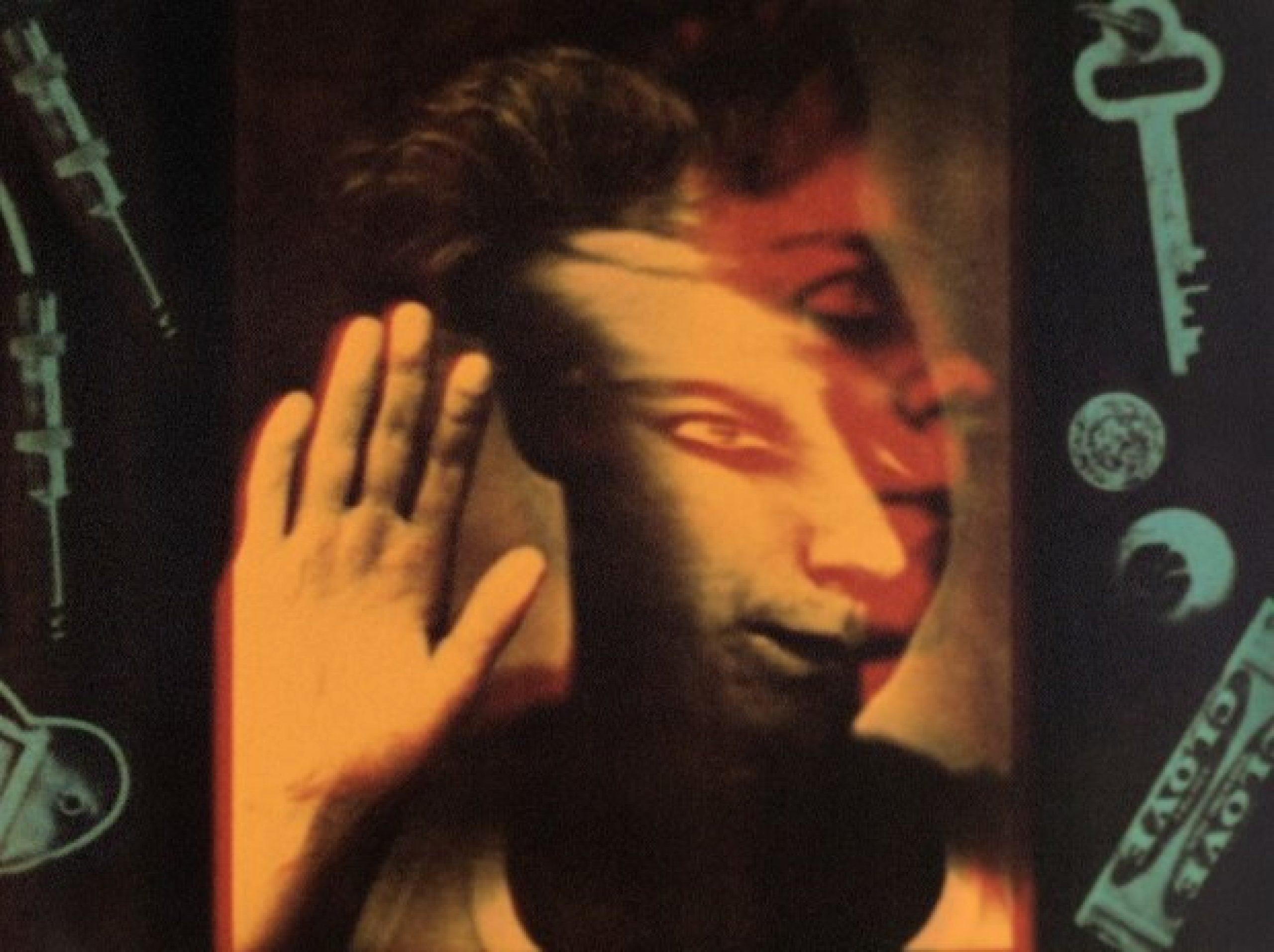 Still from "Choreography for the Copy Machine (Photocopy Cha Cha)". A face distorting into two with a red-orange color palette.