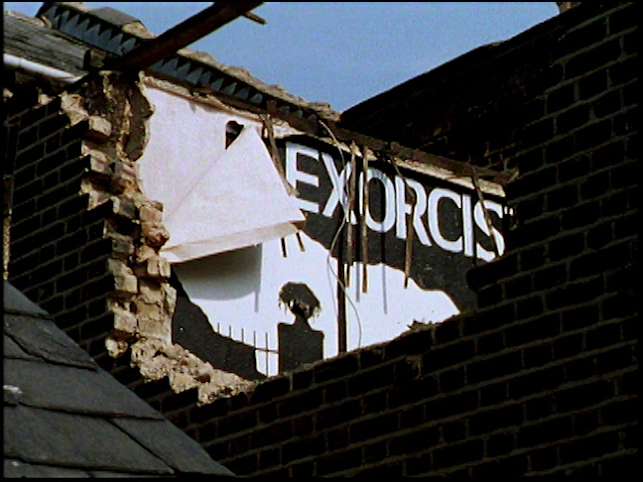 closeup of building with crumbling exposed brick