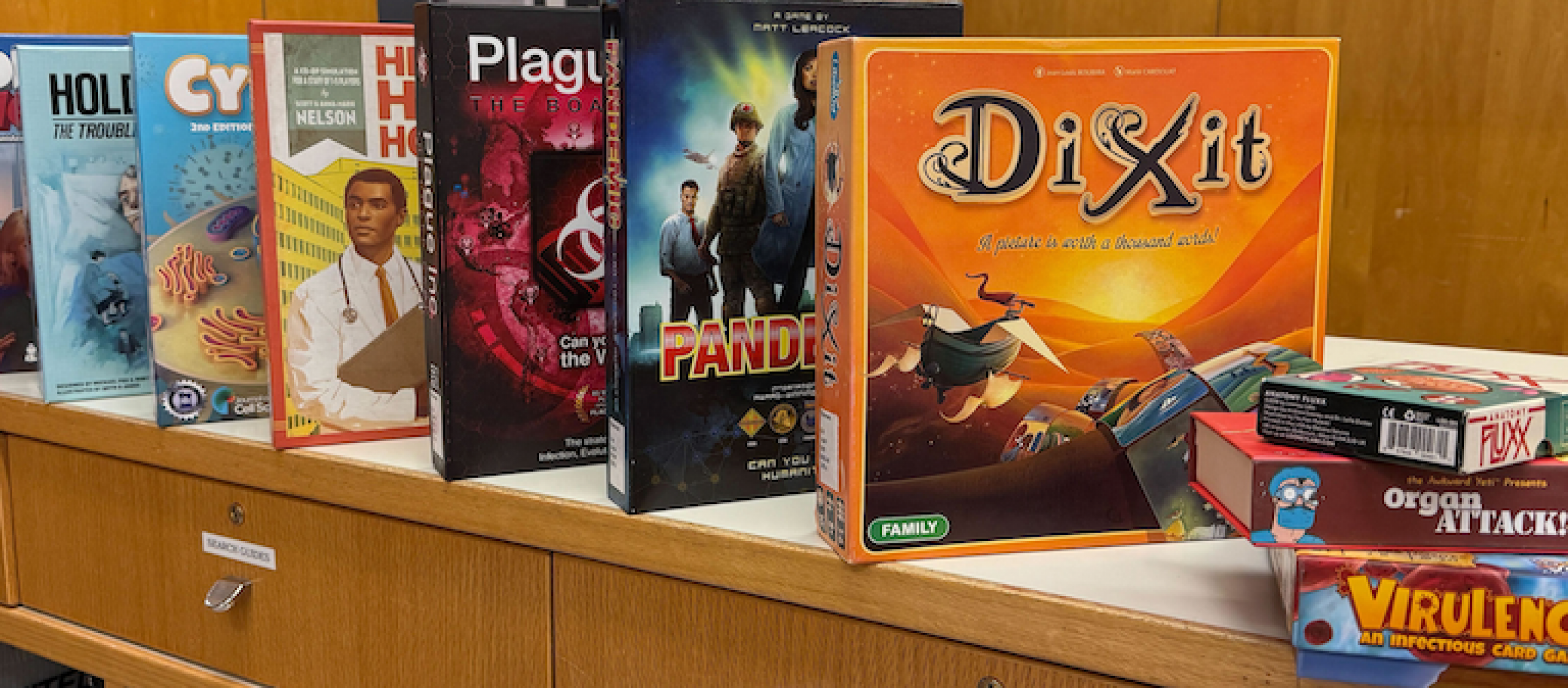 different board games lined up in a row