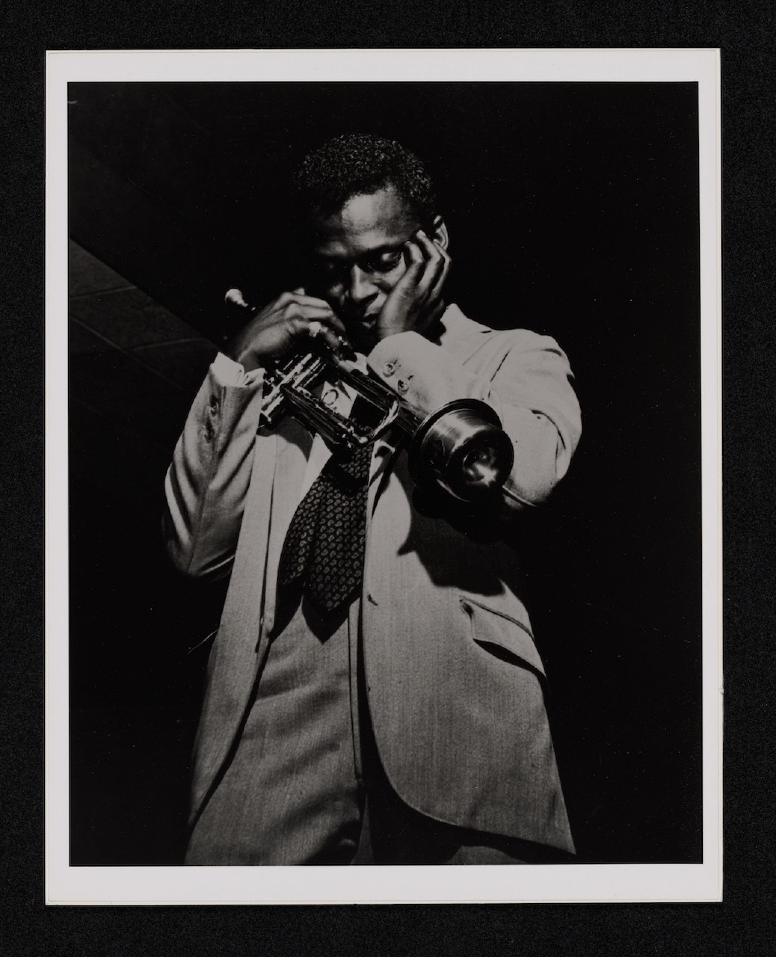 black and white photograph of Miles Davis