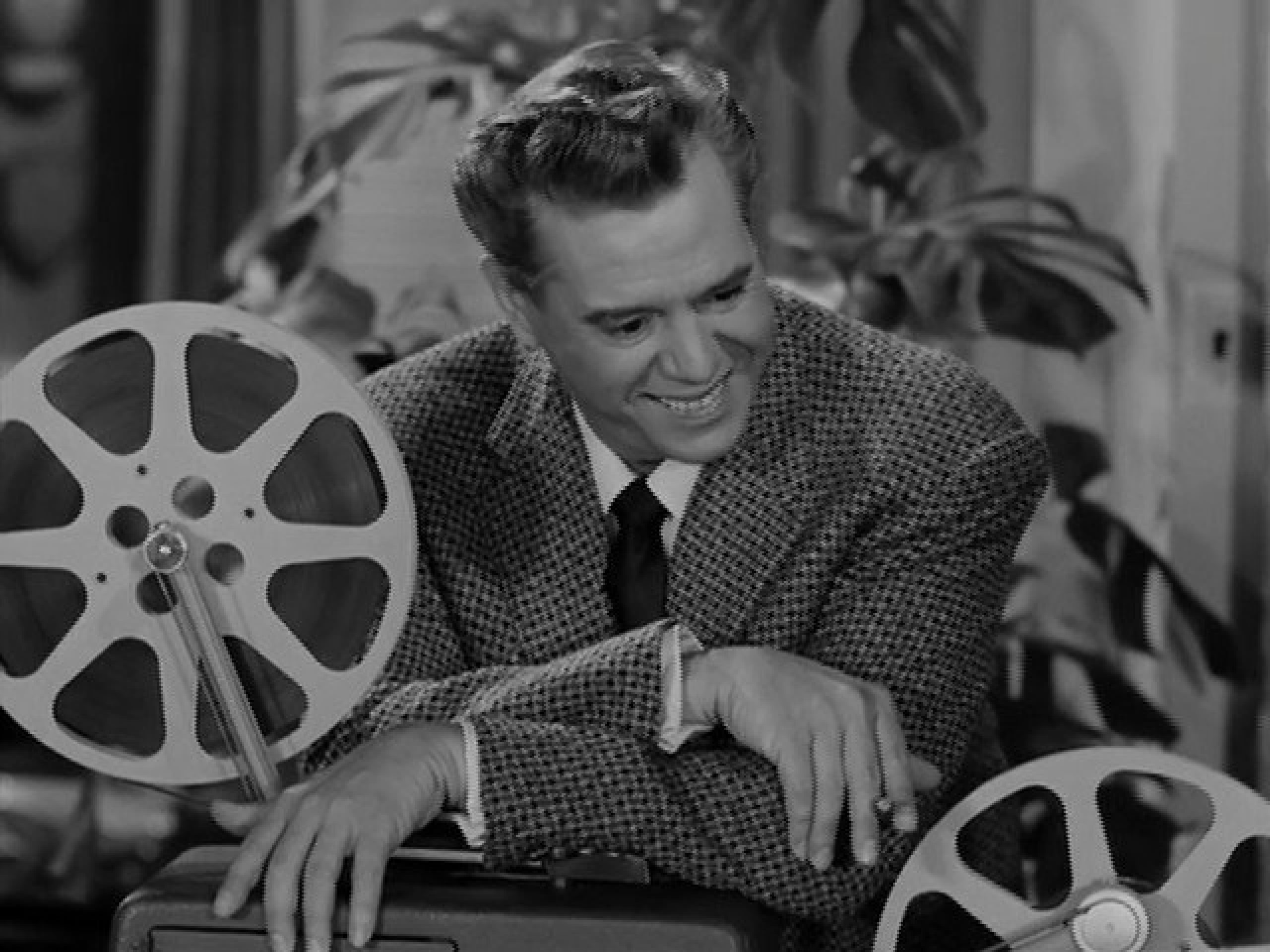 Desi Arnaz smiling by television film