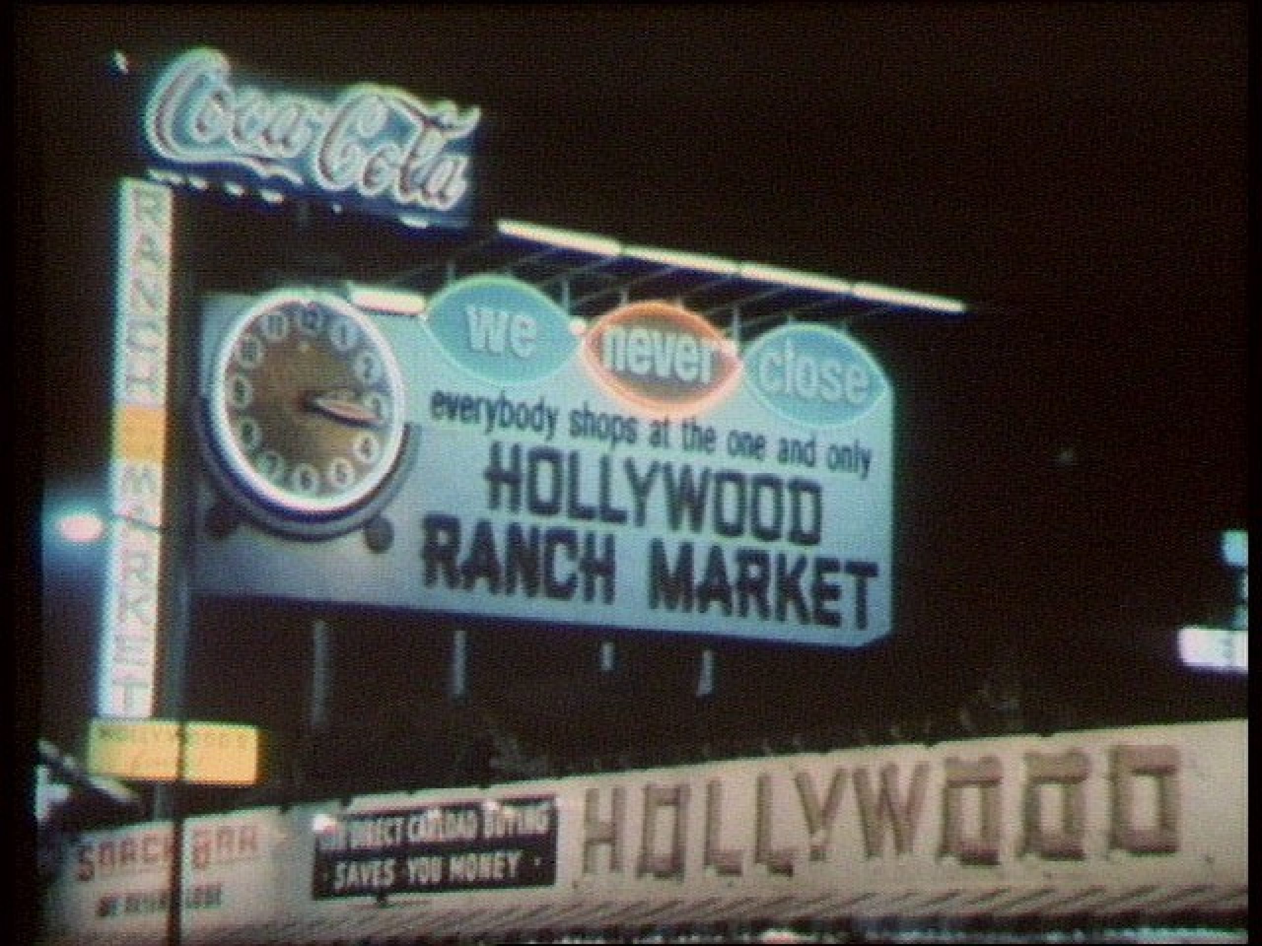 A vintage sign that says "Everyone shops at the One and Only Hollywood Ranch Market"
