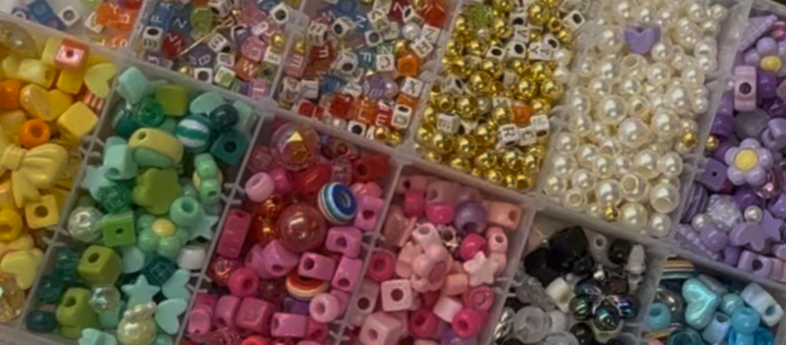 colorful beads in a tray